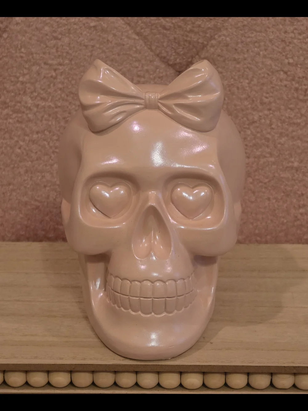 Bow Accent Heart-Eye Skull Figurine in Blush Pink